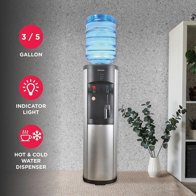 Frigidaire EFWC519 stainless steel top loading water cooler in a room with plants