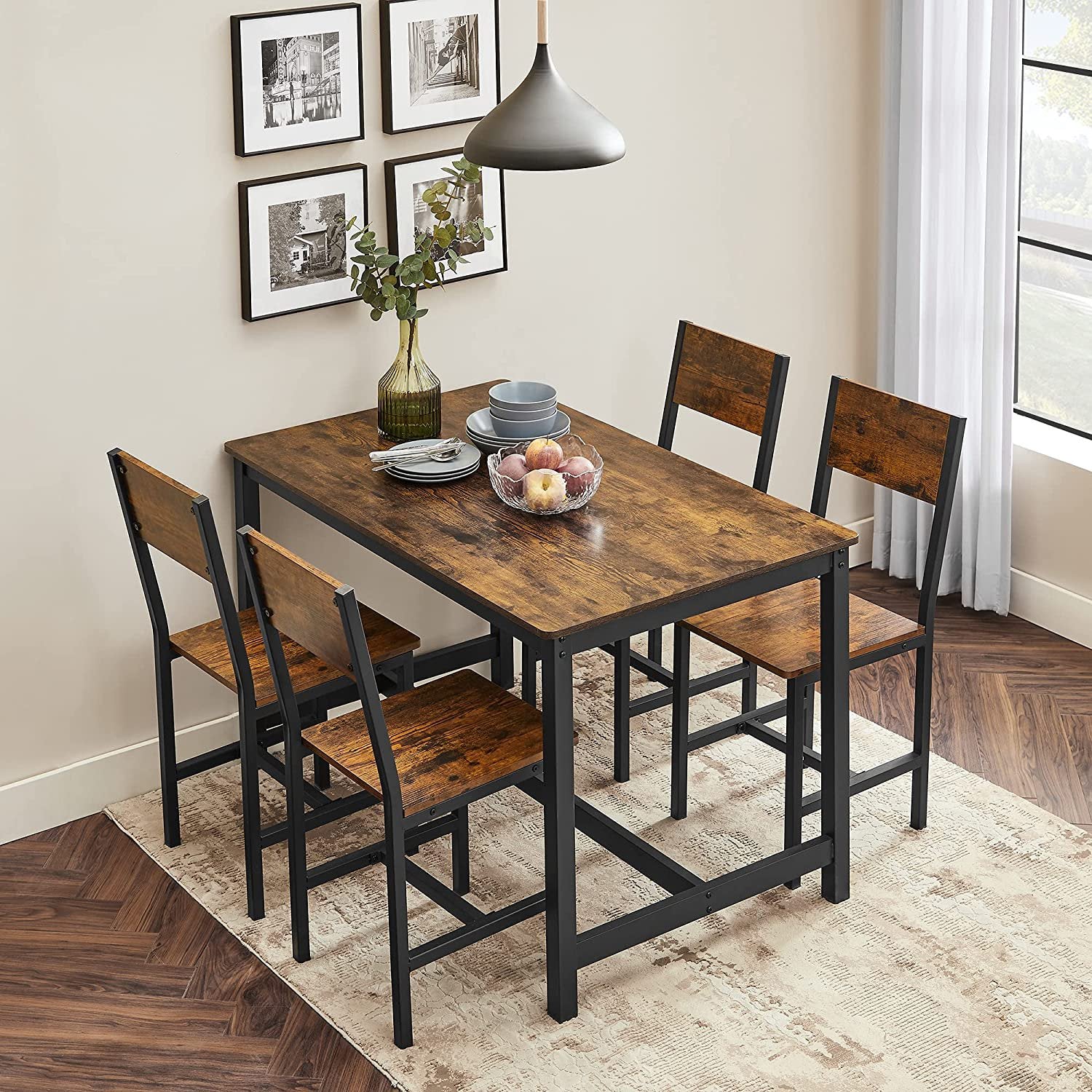 VASAGLE ULDC092B01V1 dining chairs staged around a table; room furniture is display staging