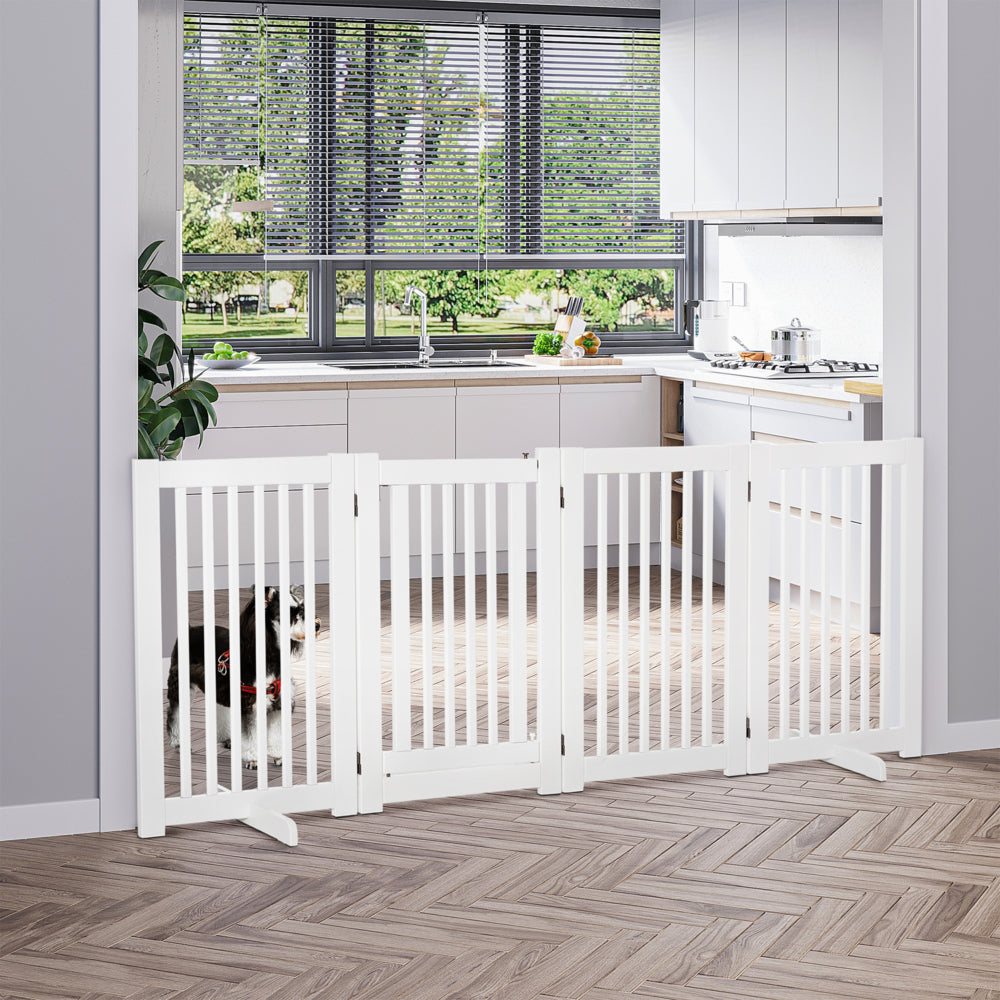PawHut D06-046WT white four-panel pet gate — closed gate installed in a kitchen doorway