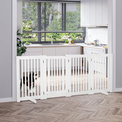 PawHut D06-046WT white four-panel pet gate — closed gate installed in a kitchen doorway